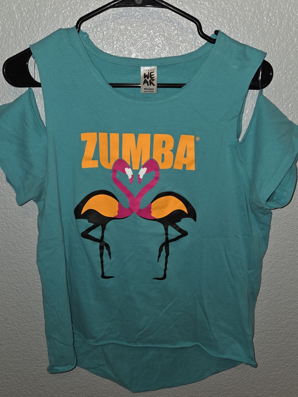 Zumba Fitness Teal Cold-Shoulder Tee with Orange Logo and Pink Flamingos